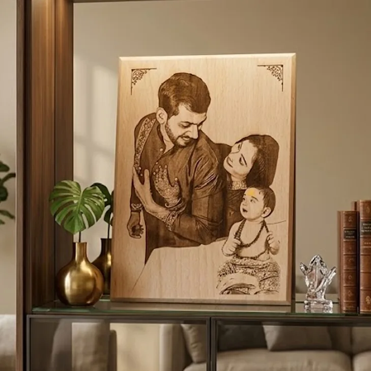 Personalised wooden engraving frame displayed on a shelf